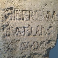Limestone block with a worn Latin inscription naming Pontius Pilate (a museum replica of the Pilate Stone)